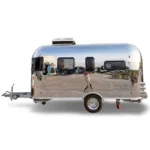 Stainless steel Airstream Allie CODE 2607 midsize caravan with rooftop AC, windows and single axle for travel