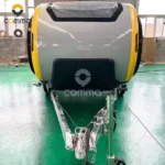 Front view of Back to the Future CODE 2604 teardrop mini caravan with yellow trim, sunroof and galvanised A-frame tow hitch