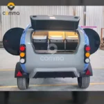 Back to the Future (CODE 2604) teardrop caravan rear with open hatch, storage nets and tail lights visible