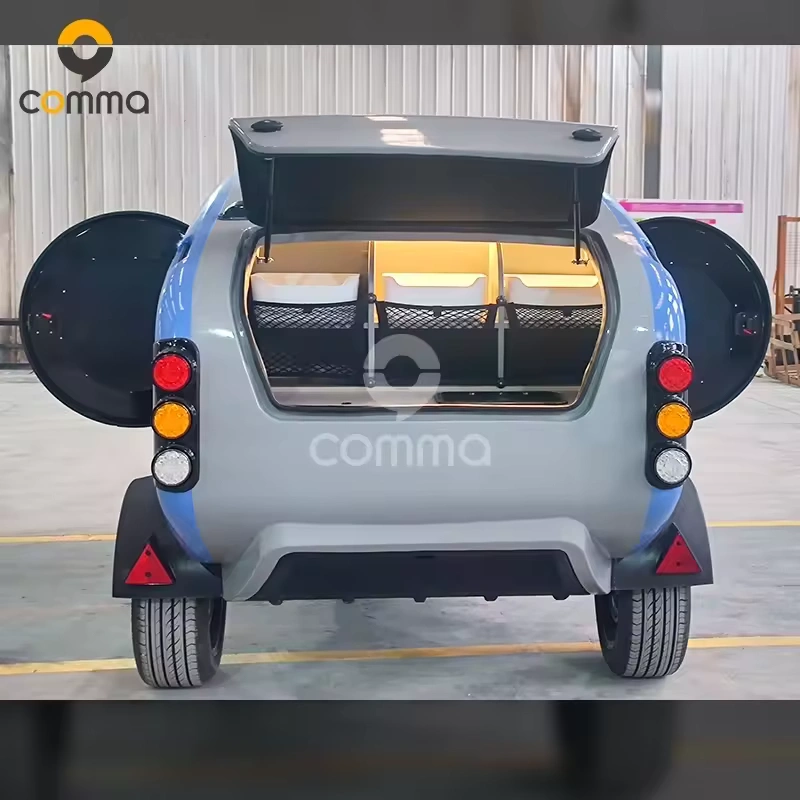 Back to the Future (CODE 2604) teardrop caravan rear with open hatch, storage nets and tail lights visible