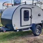 WECARE Basic Teardrop Mini Camper Trailer featuring a galvanized steel frame for off-road adventure travel.