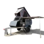 Offroad Olly RTT camper trailer with rooftop tent, galvanized steel frame, and awning for off-grid camping adventures.