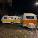 Retro Capsule Mini Off Road Caravan Orange And Yellow Night Exterior