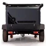 Rear view of the Swiss Army Andy off-road camper trailer showing its durable aluminum exterior and rugged tires.