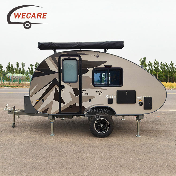 WECARE off-road teardrop caravan with ensuite and rooftop awning parked outside for your next off-grid adventure.