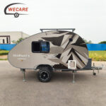 WECARE Teardrop with Ensuite mini caravan with off-road ready features and aluminum exterior for adventure camping.