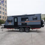 The sleek grey exterior of the TF series off-road caravan, a compact and durable motorhome perfect for your adventure.